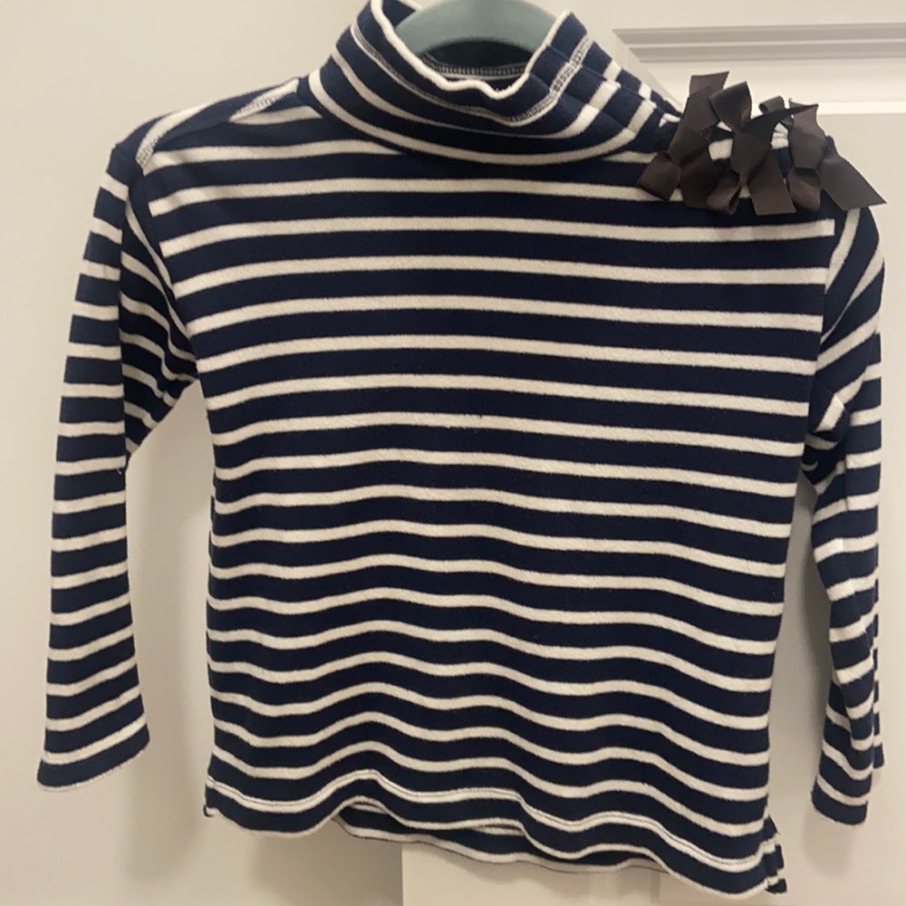 Crewcuts Fleece Turtleneck with bow details. Size 6-7